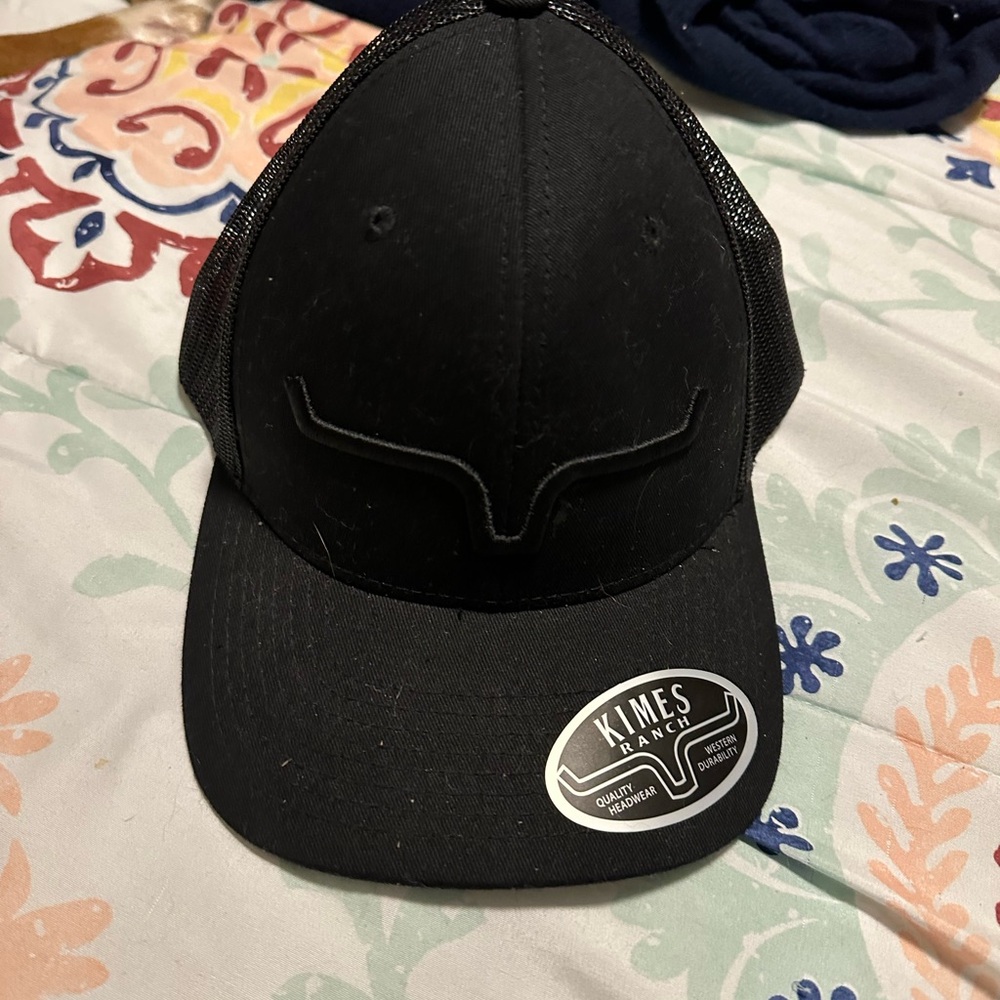 Kimes Ranch Black Hat with Curved Brim and Adjustable Closure